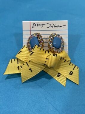 Betsey Johnson Yellow
Measuring-Tape Bow Earrings with Blue Rhinestones